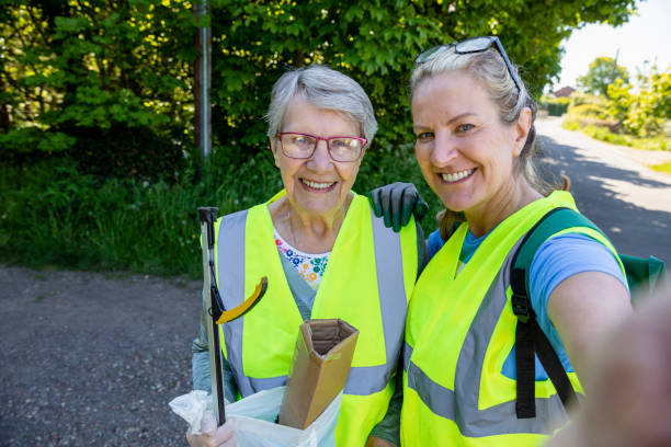 istock Mother and Daughter Volunteer Selfie 1333778829