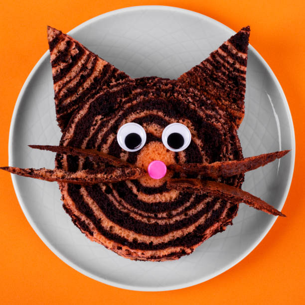 istock Tiger cake on ceramic plate. Dessert for 2022 1333784371