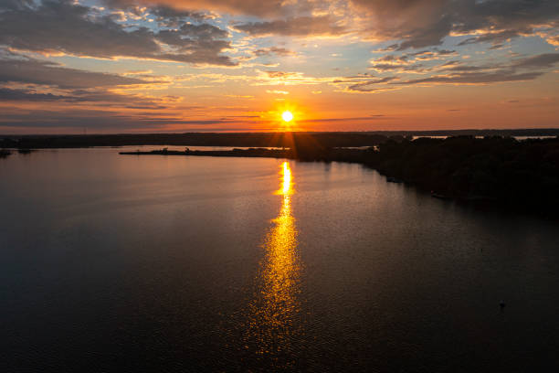 istock Deep Orange sun streak on a lake 1333785929
