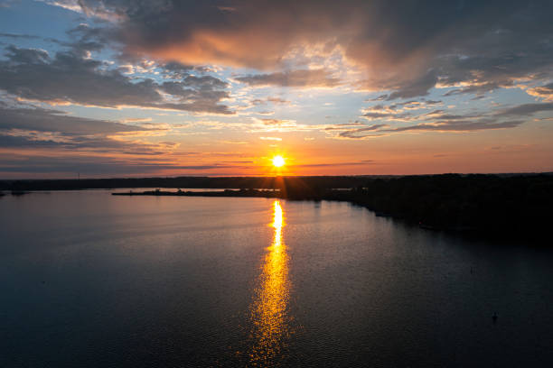 istock Early Morning Sunrise captured over a lake 1333785953