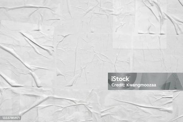 Blank White Crumpled And Creased Paper Poster Texture Stock Photo - Download Image Now