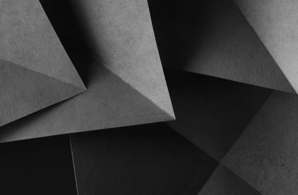 istock Geometric shapes made paper, dark background 1333788044