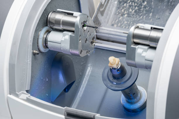 istock CAD CAM dental computer-aided machine. Digital modern dental laboratory for prosthesis and crowns milling 1333788200