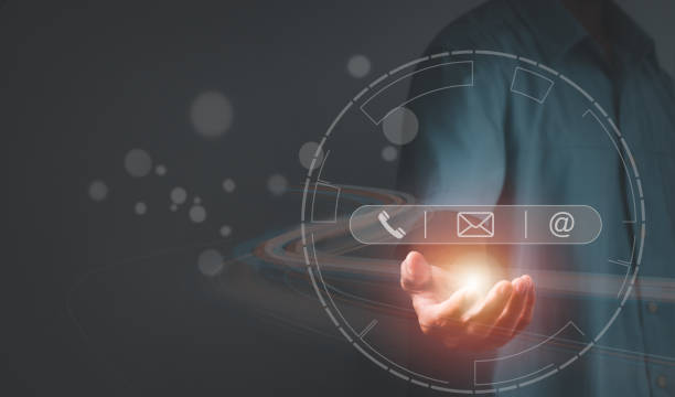 istock The concept is Customer support service, CONTACT US, Help Centre. Man hand touching on the mobile phone screen with mail, phone, the email icon on virtual screen. 1333790730