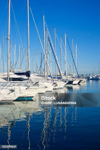 Blue Denia Marina Port In Alicante Spain Stock Photo - Download Image Now - Marina, Sailboat, Yacht