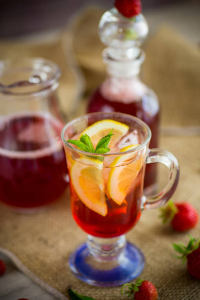 istock refreshing cool strawberry lemonade with lemon, ice and mint in a glass 1333793005