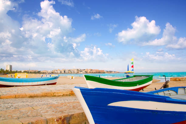 beach of Salou with beached boats in Tarragona Catalonia Spain