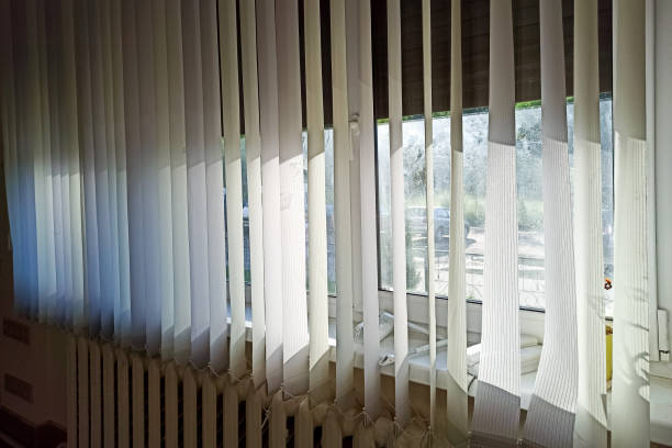 istock Vertical blinds on the window in the sunlight 1333793649