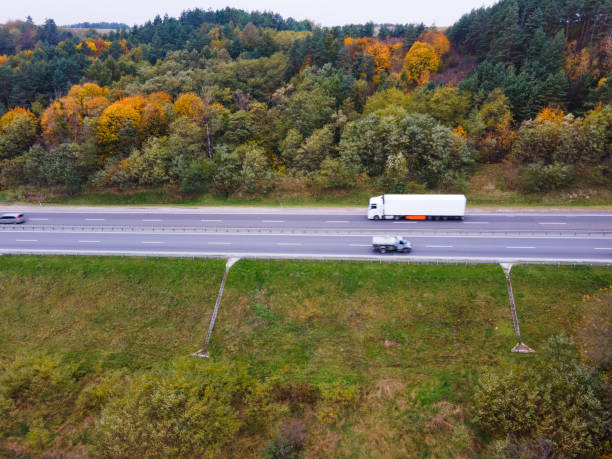 istock aerial view of autumn highway 1333799837