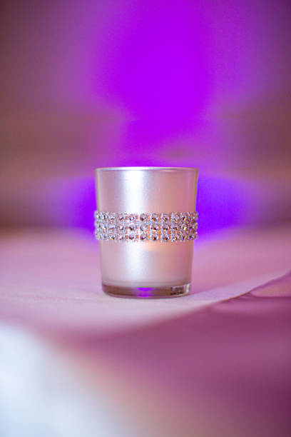 istock Silver decorative candle stick holder with jewels centerpiece on table at wedding reception 1333808231