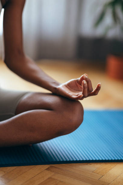 istock An Anonymous Woman Meditating at Home 1333812767