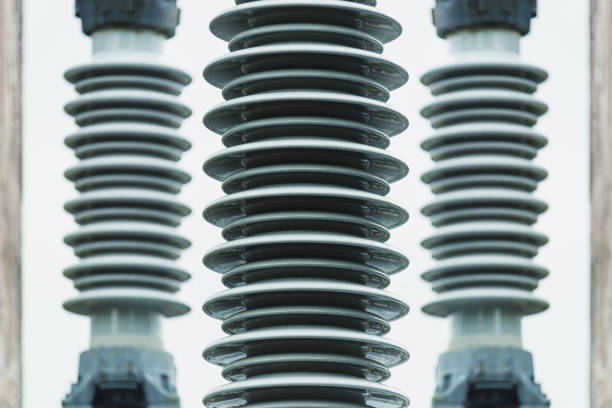 Ceramic insulators at an electrical substation at a hydroelectric power station. Symmetrical composite.