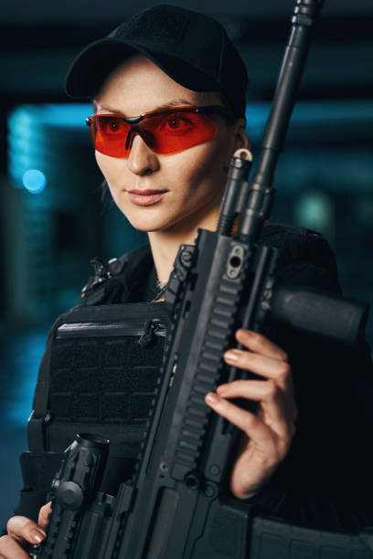 istock Pensive shooter in protective eyewear holding a weapon 1333814605