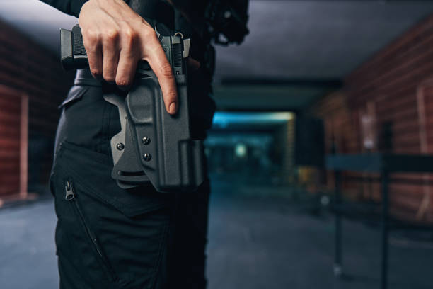 istock Female getting ready to shoot her handgun 1333814616