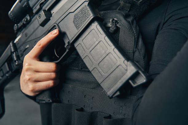 istock Female sniper preparing to fire a weapon 1333814710