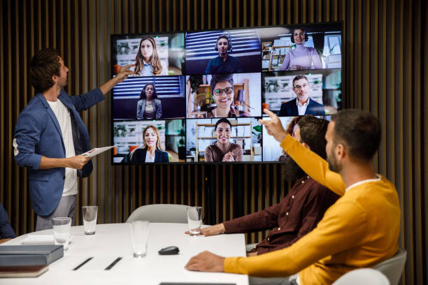 istock Three businessmen chatting with their colleagues over a video call 1333816295