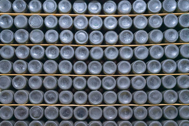 istock bottles of old wine in wine cellars 1333819975