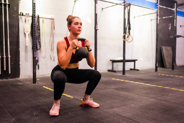 istock Woman in a Cross Training Gym 1333820066