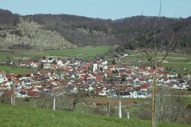 little German countryside town surrounded by hills and cliffs