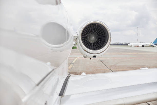 istock Business jet is standing on airport parking 1333825492