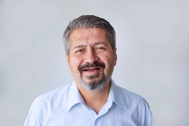 toothless man, smiling toothless man on a gray background - toothless grin imagens e fotografias de stock