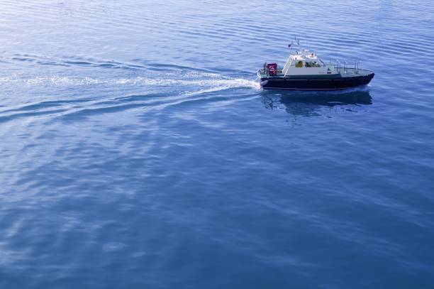 istock Blue Mediterranean Sea with pilots boat 1333836657