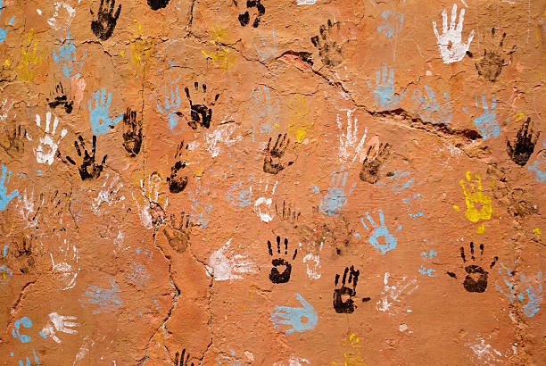 istock colorful hand prints on brown wall 133384066