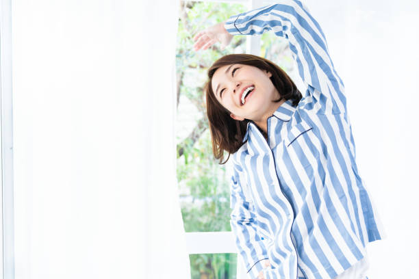 istock asian woman in night clothes 1333846082
