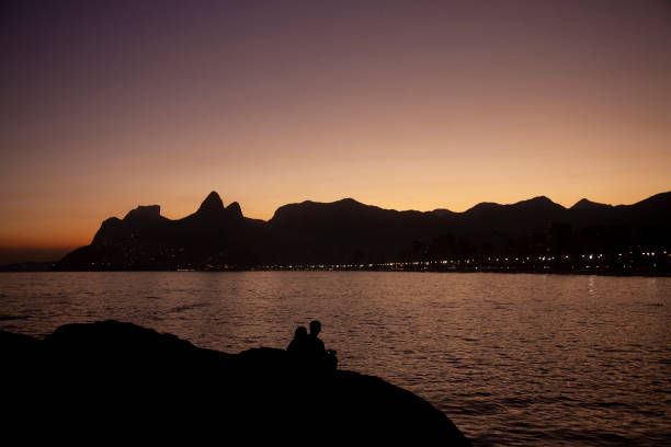 Couple at sunset in Ipanema - Rio de Janeiro - Arpoador