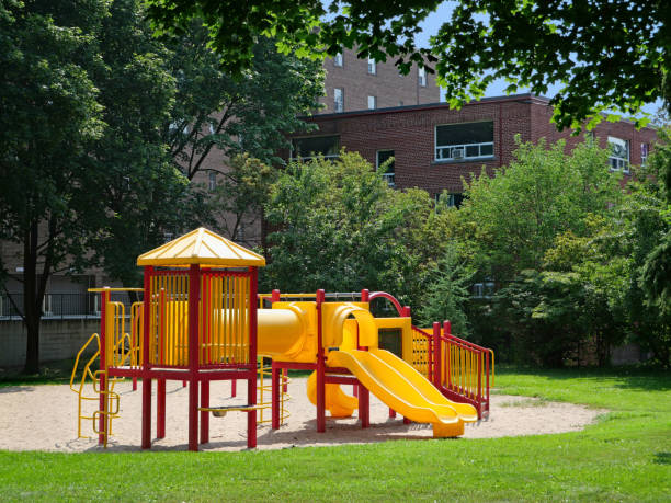 istock Brightly colored plastic playground equipment in a schoolyard 1333853176