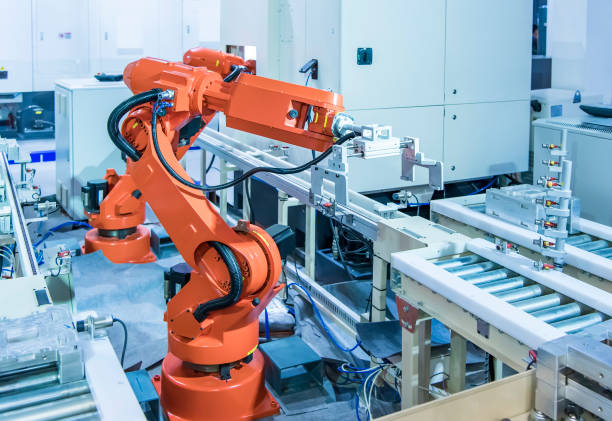 travail automatique des robots robotiques industriels, industrie 4.0 et concept technologique - bras robotisé outil de production photos et images de collection