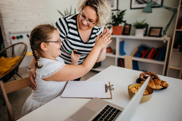 istock We are learning at home on laptop 1333859815