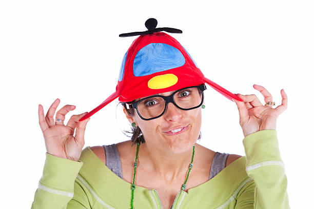 kobieta z zabawny kapelusz - propeller beanie zdjęcia i obrazy z banku zdjęć