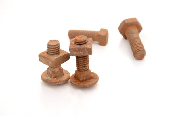 istock the orange color rusty iron bolt nut isolated on white background. 1333860770