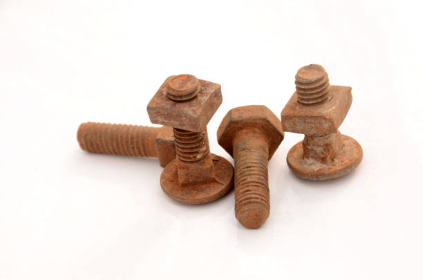 istock the orange color rusty iron bolt nut isolated on white background. 1333861294