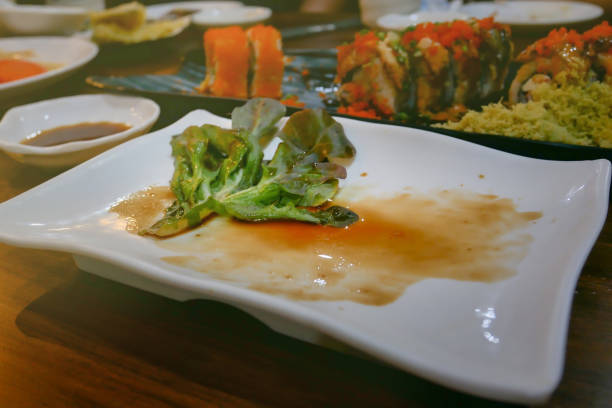 Japanese food and empty white plate