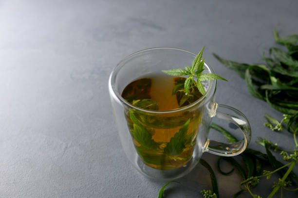 istock Cup of herbal cannabis tea 1333875564