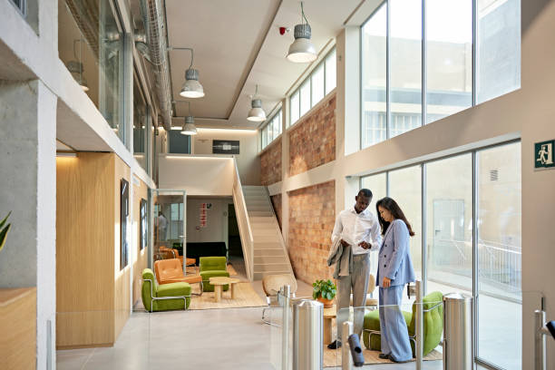 istock Commercial Real Estate Agent and Client at Office Property 1333877313