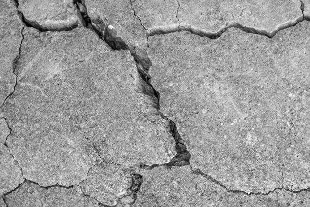 istock old concrete cement with cracks and natural destruction 1333878112