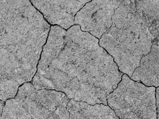 istock old concrete cement with cracks and natural destruction 1333878118
