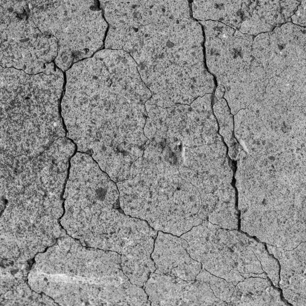 istock old concrete cement with cracks and natural destruction 1333878531