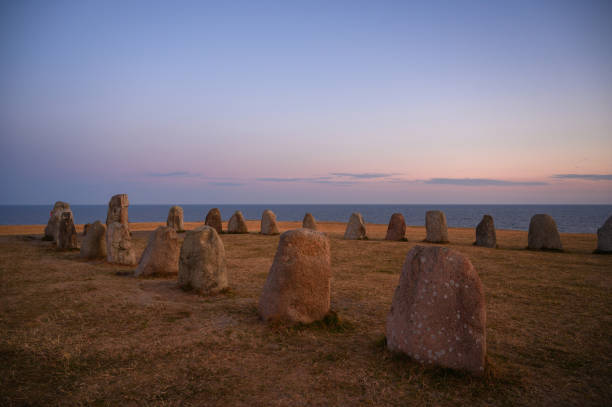 Ale's Stones The Ale’s Stones megalithic monument on Sweden’s southernmost coast. ales stenar stock pictures, royalty-free photos & images