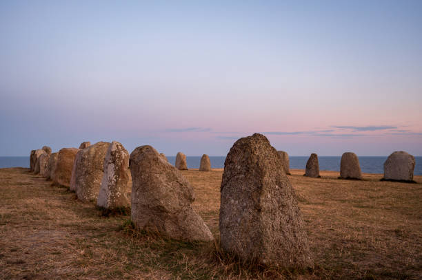 Ale's Stones The Ale’s Stones megalithic monument on Sweden’s southernmost coast. ales stenar stock pictures, royalty-free photos & images