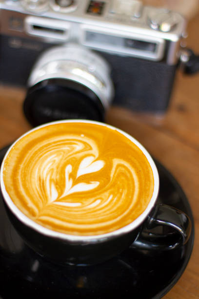 istock Cup of coffee latte in coffee shop 1333882644