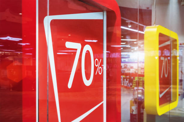 istock 70 percent discount billboard hangs behind showcase during sale 1333883893