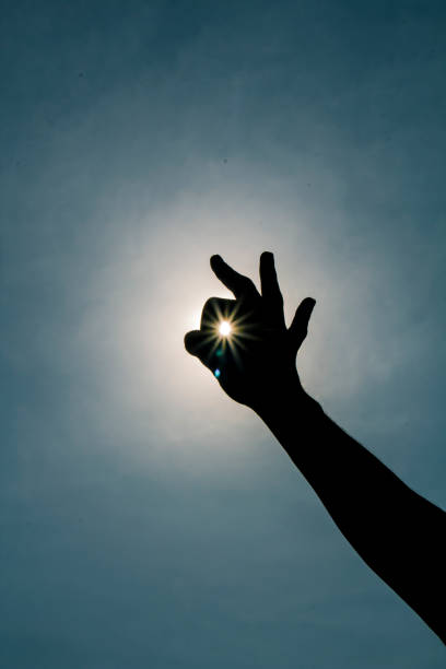 istock Sun caught in the hand 1333883924