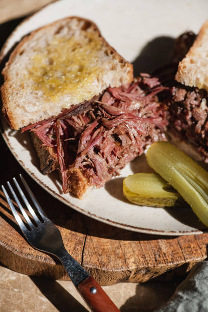 istock Homemade Pulled beef Reuben sandwich with sourdough bread, close-up 1333888770