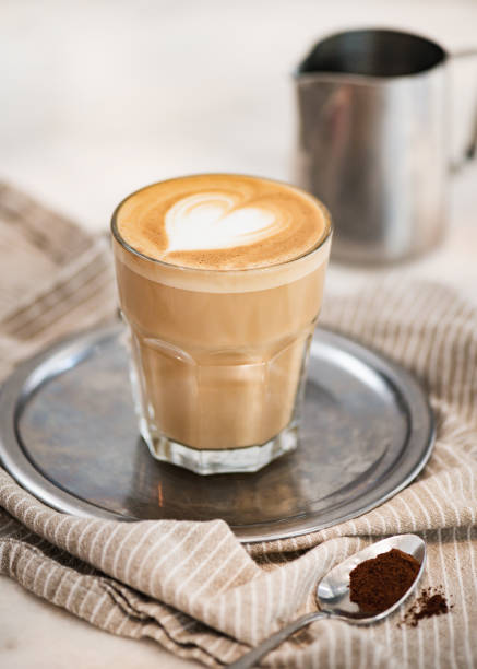 istock Flat white coffee with heart shaped foam milk on tray 1333888774