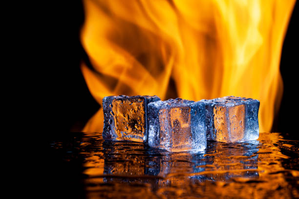 istock three ice cubes against the background of fire, fire and ice, place under the text 1333894476