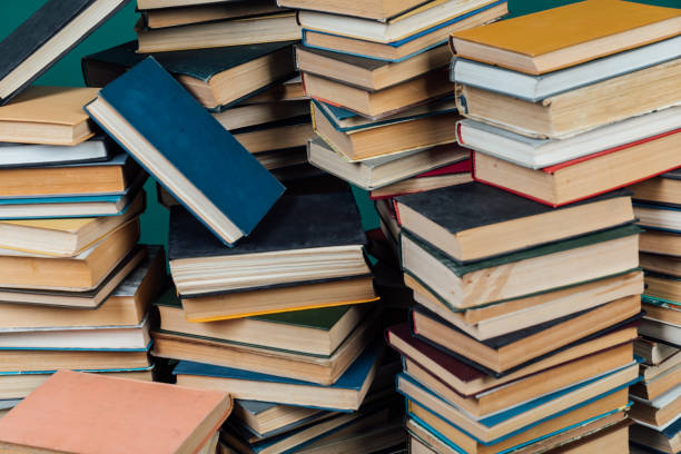 istock stacks of books for teaching knowledge of the university library green background 1333894571